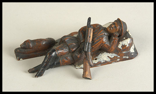 Carved Wood Hunter at Rest